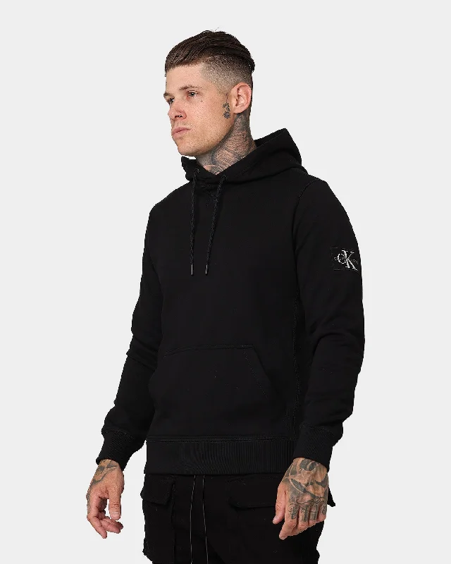 Calvin Klein Monogram Sleeve Badge Hoodie Black Hoodie with Elastic Cuffs Stretchable Comfortable